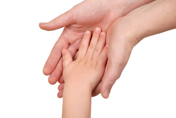 istock Mommy and her child hand 96469390