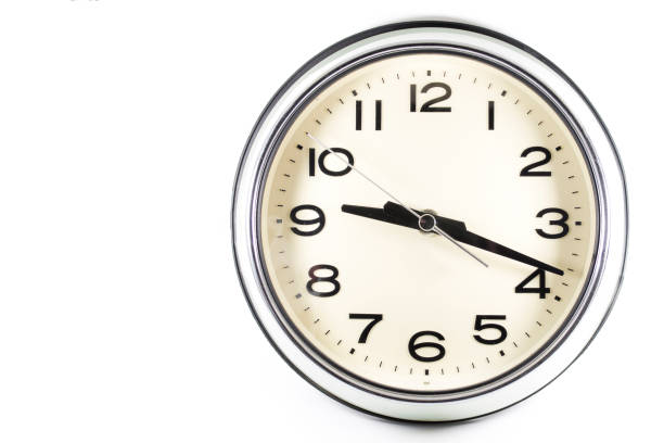 istock Isolated white background of vintage wall clock 964696326