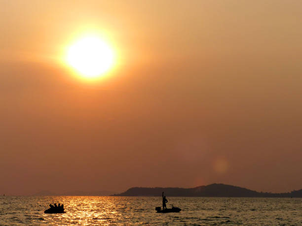 istock people on the boat at sunset 964700920
