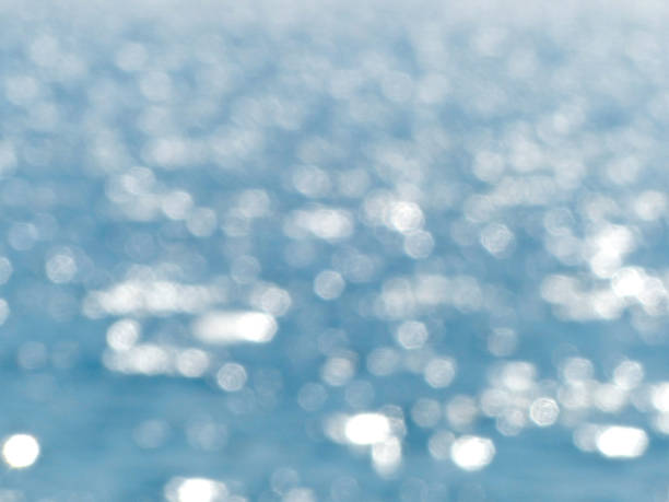 istock blue christmas background with bokeh lights 964701108