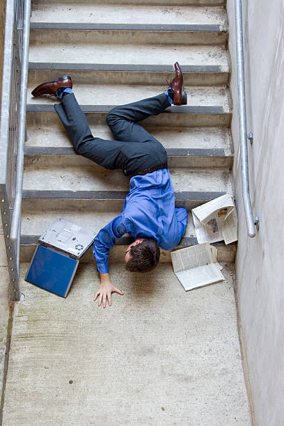 Man Falling Down Stairs Stock Photo - Download Image Now - Falling,  Staircase, Misfortune - iStock