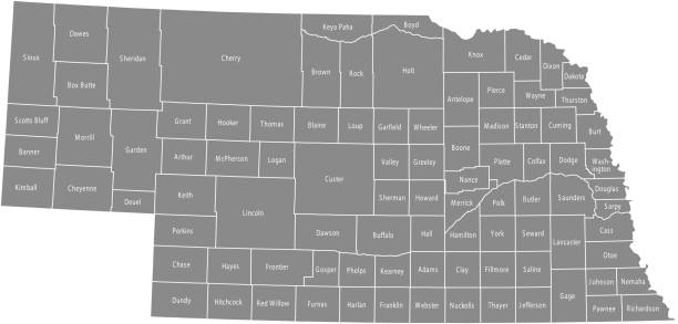 Nebraska county map vector outline gray background. Map of Nebraska state of USA with borders and counties names labeled Nebraska county map vector outline gray background. Map of Nebraska state of USA with borders and counties names labeled kearney nebraska stock illustrations