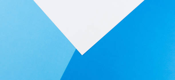 istock Color papers composition background with white and blue tones 964722182