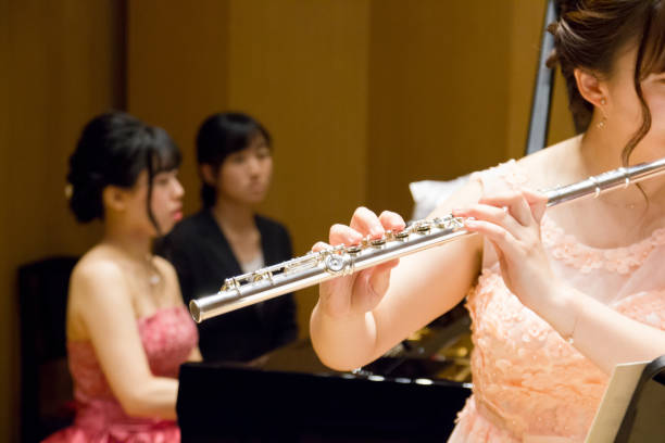 istock Flutist and Pianist on stage. 964722184
