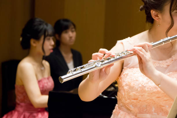 istock Flutist and Pianist on stage. 964722608
