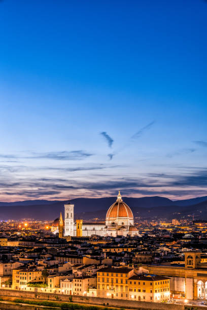 istock Florence's cathedral and skyline at sunset 964733722