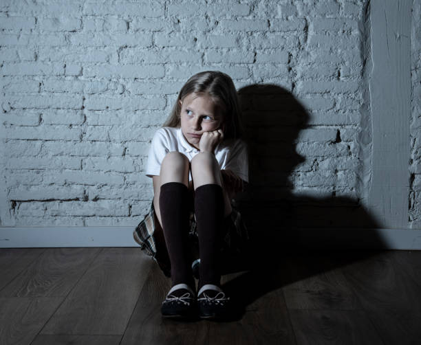 istock Sad desperate young girl suffering from bulling and harassment at school 964733794