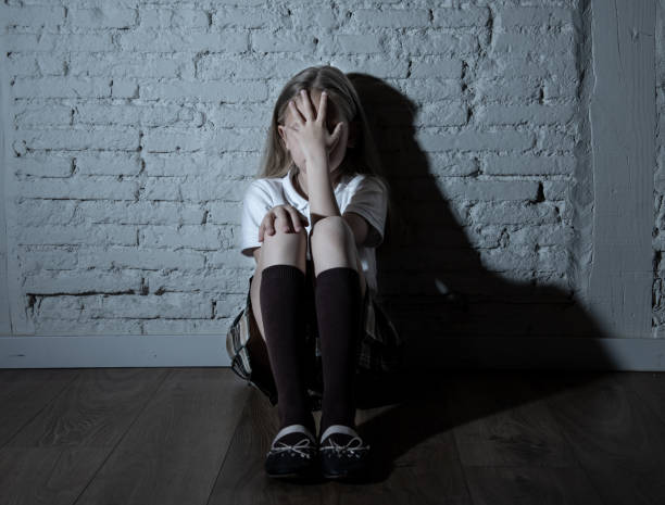 istock Sad desperate young girl suffering from bulling and harassment at school 964733802