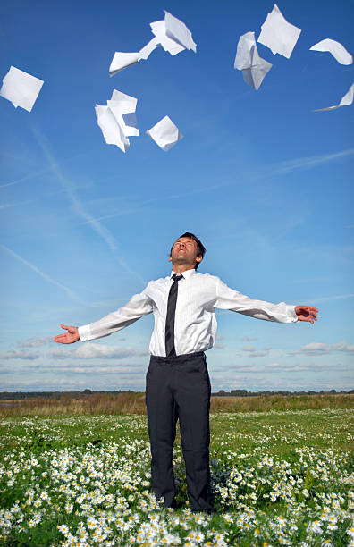 istock Businessman throwing papers outdoor 96473839