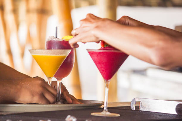 Refreshing cold lemonade with citrus flavor. The concept of summer cocktails on vacation.