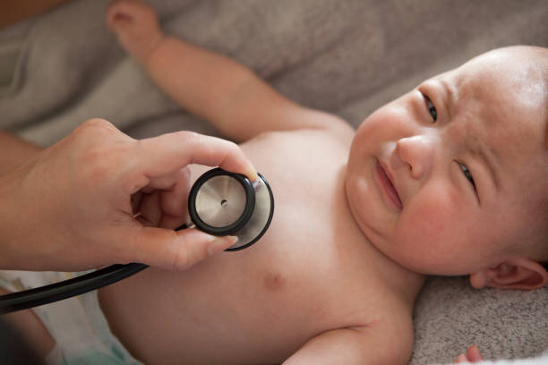 istock A baby being heard heart sounds in a stethoscope. 964743142