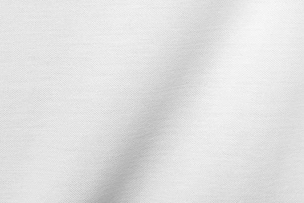 istock White fabric texture background. Clothing material wallpaper. 964746414