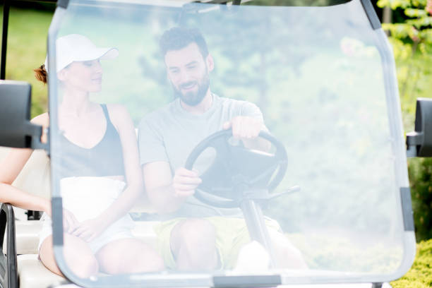 istock Couple in the golf cart 964754848