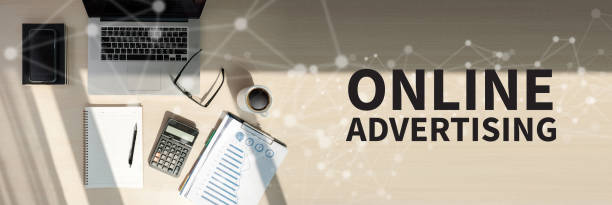 istock ONLINE ADVERTISING Business team work with financial reports banner with copy space 964754866