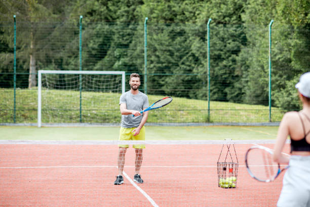 istock Couple playing tennis 964755412