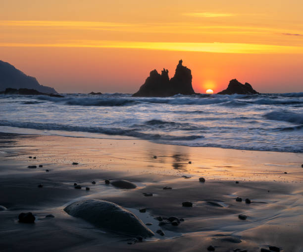 istock romantic and at the same time dramatic sunset on Benijo beach in tenerife 964755632