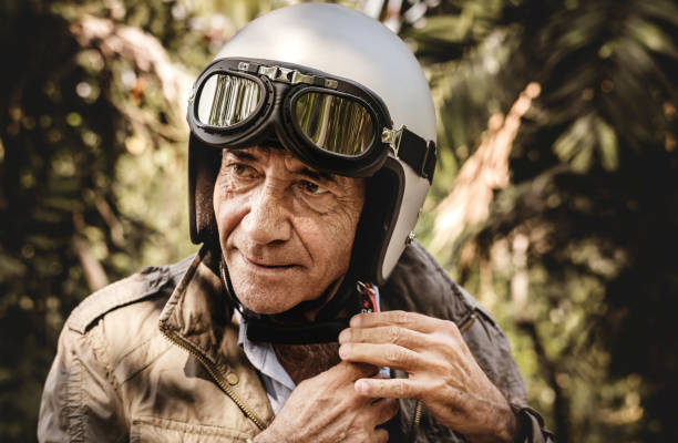 istock Mature man putting on a helmet 964762360