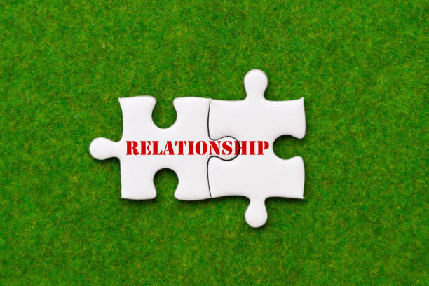 istock two connected jigsaw puzzle pieces with relationship woring 964770508