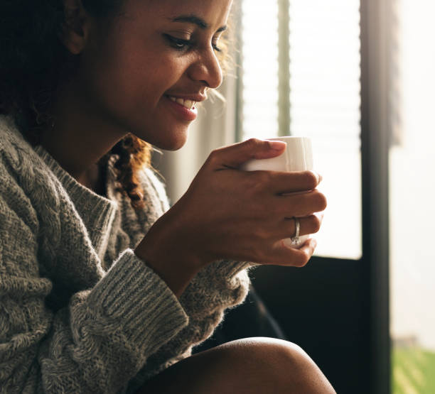 istock Woman having a warm cup of coffee 964771316