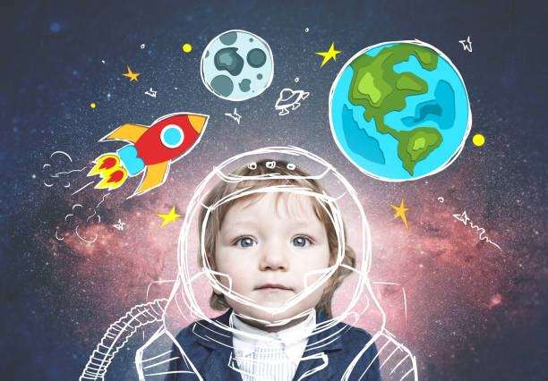 istock Cute little boy in astronaut suit in doodle space 964775680