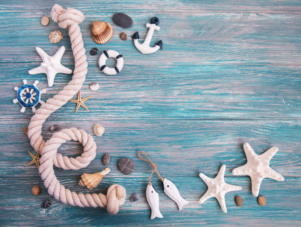istock Seashells and sea decorations with rope 964778166