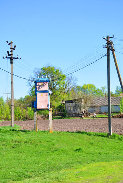 istock a transformer booth standing on the grass near the pillars 964779240