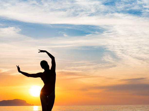 istock serenity and yoga practicing at sunset, meditation 964782664