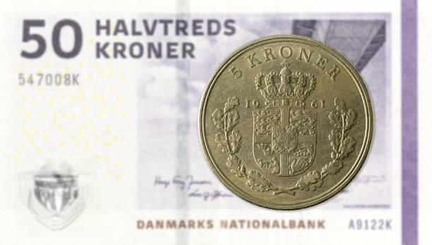istock 5 danish krone coin against 50 danish krone note 964785214
