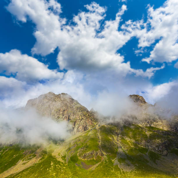 istock beautiful mountain valley and cloudy sky 964785462