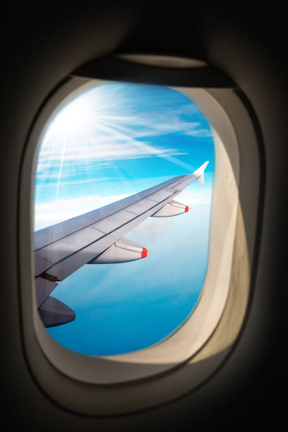 istock Airplane Wing - Through the Porthole Window 964785922