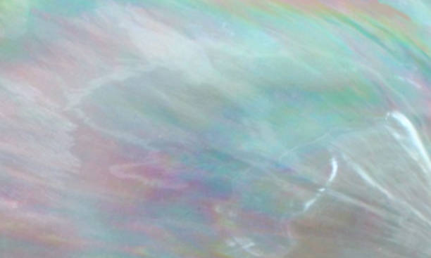 istock Abstract mother of pearl mauve and turquoise background 964786190