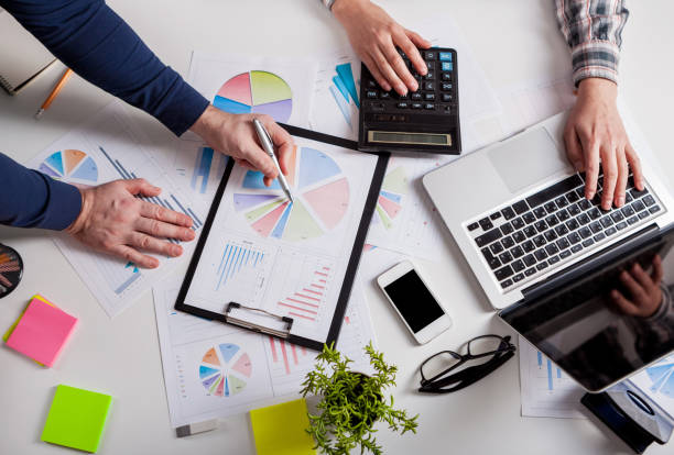 istock Stock market chart and finger pointing 964790154