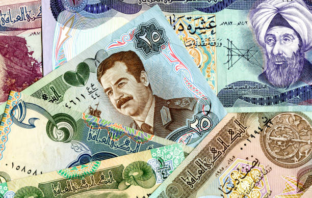 istock Background from old different banknotes of Iraq money 964790202