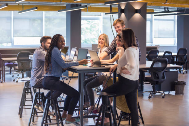 istock Young coworkers in modern office 964792754