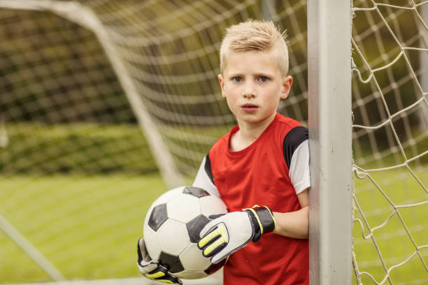 istock A boys soccer team goalkeeper 964793930