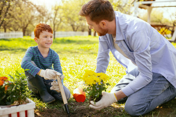 istock Cheerful happy boy smiling to his father 964796432