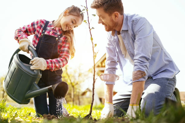 istock Happy delighted man looking at his daughter 964801414