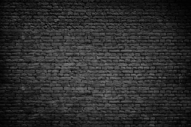 wall Old dark brick stones wall background brick wall photos stock pictures, royalty-free photos & images
