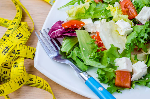 istock Dietary salad with tomatoes and feta cheese 964824092