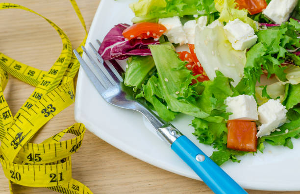 istock Dietary salad with tomatoes and feta cheese 964824104