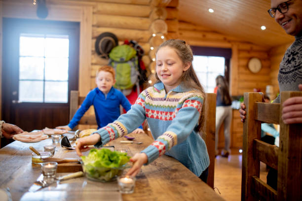 istock Helping her Family Set the Table 964825298