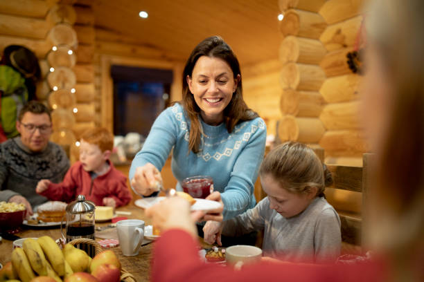 istock Serving Dessert to her Family 964828780