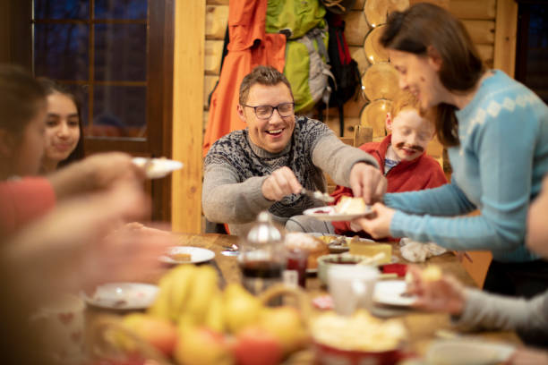 istock Serving Dessert to her Family 964828986