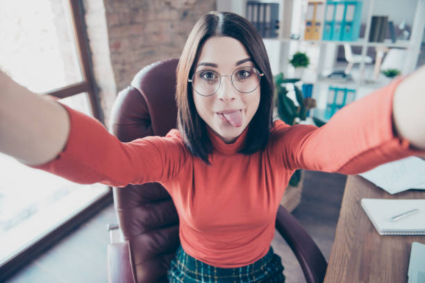 istock Take make employment education interior workplace agent happiness video call internet connection new job social network people person concept. Close up of lovely comic secretary sitting on armchair 964829210