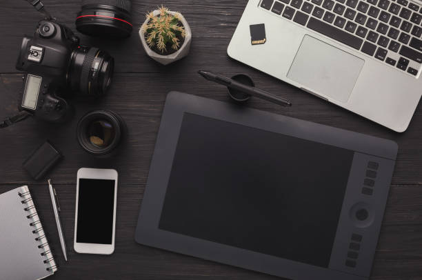 istock Designer workplace with graphic tablet and laptop 964838428