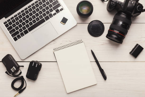 istock Photographer equipment and blank notepad 964838648