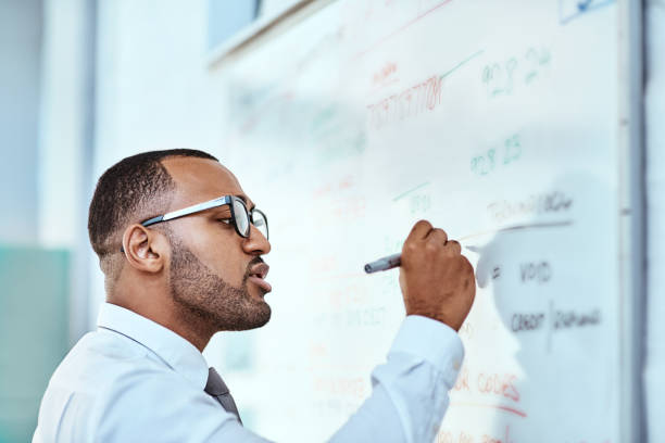 istock Getting all his ideas out on the board 964839258