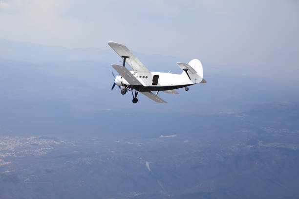 istock Vintage biplane in air 964842102