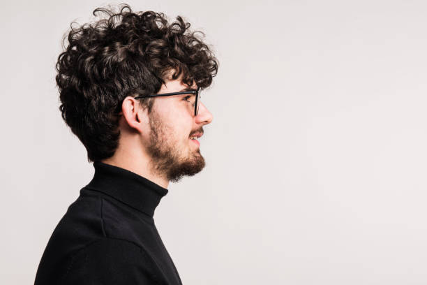 istock Portrait of a young man in a studio. Copy space. 964843692
