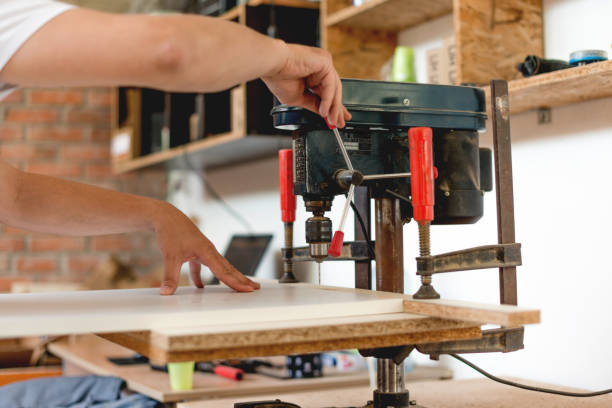 istock Drilling holes in the plank 964847392
